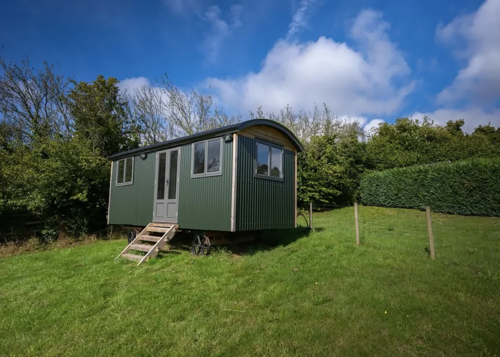 Camo 2 to 4 Sleeper Shepherds Hut In a field