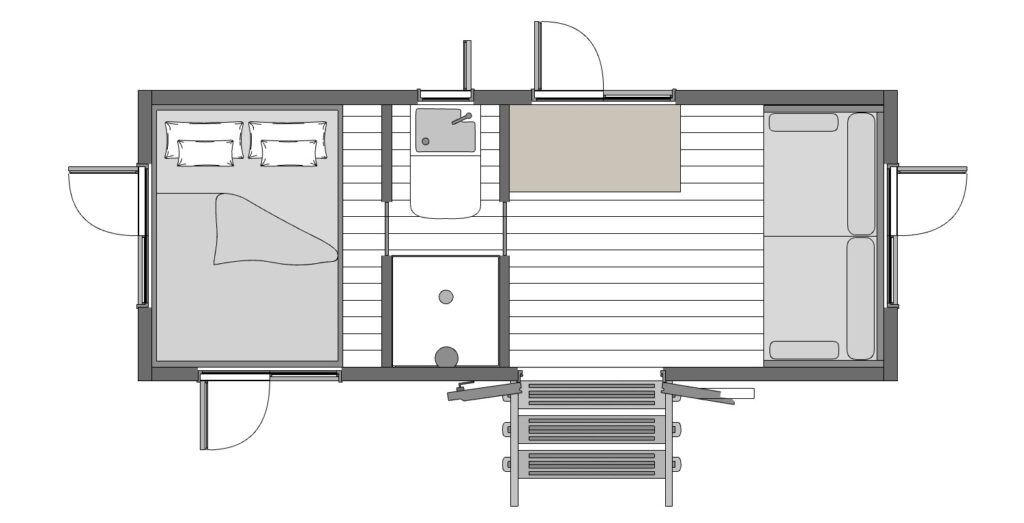 The Lodge Floor Plan showing the bed, bathroom and seating areas.