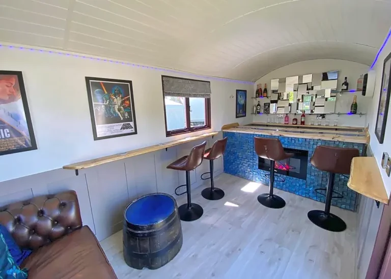 The Bar has a large seating and standing area - Belringham Shepherd Huts
